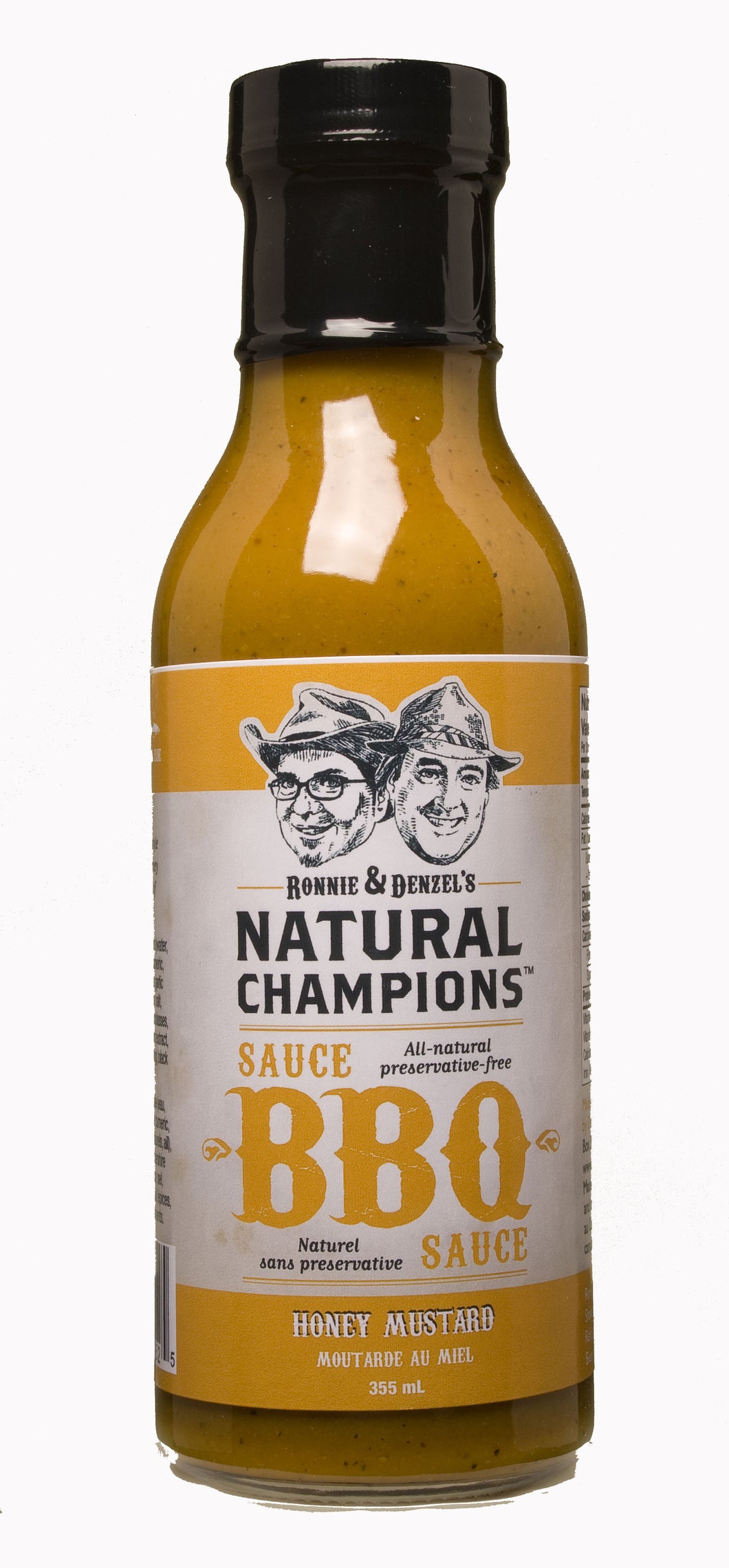 A 355ml bottle of Ronnie and Denzel's Natural Champions Honey Mustard BBQ Sauce.